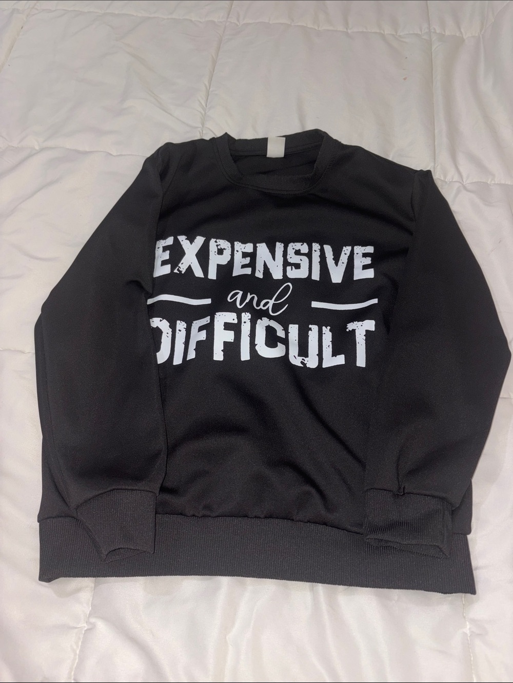 Black Crewneck Sweater with 'Expensive and Difficult' Graphic